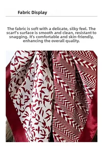 Detail of silk satin scarf showing smooth glossy texture and red swallow pattern