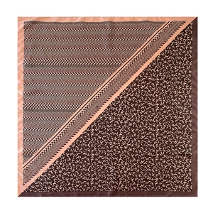Detailed close-up of 90cm satin square scarf with geometric and floral print patterns
