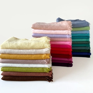 Solid color cotton linen scarf for women, multiple shades with frayed fringe detail