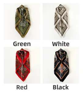 Detailed view of four paisley satin square scarves in green, white, black and red-brown