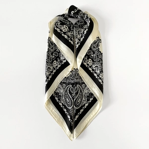 Detail of black and white paisley print satin square scarf with silky luster finish