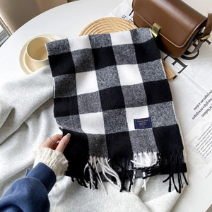 Classic black and white checkered cashmere blend scarf with tassels and fringe detail