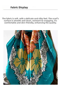Detailed macro view of soft peacock blue satin floral scarf with fine edge stitching