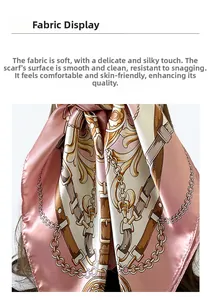 Detail of pink silk scarf showing smooth fabric texture and golden chain print pattern