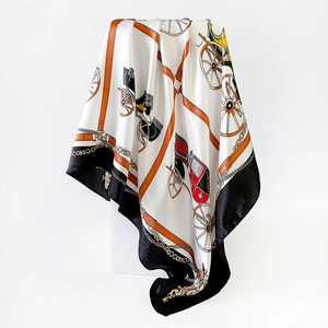 Detail of satin square scarf featuring classic equestrian carriage and harness print design