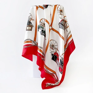 Detailed macro view of horse carriage print on 90cm satin silk square scarf with red border