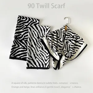 Classic 90x90cm zebra print silk scarf in black and white with premium twill texture