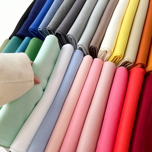 Variety of colorful solid thick blend shawls and scarves with soft tassel detail