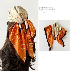 Elegant orange and beige floral satin scarf for women with sophisticated abstract print
