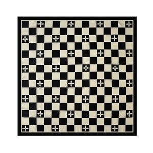 Détail d'un foulard carré à carreaux avec motifs floraux et bordure noire élégante
