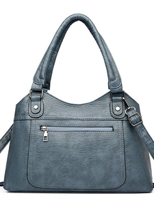 Grey blue washed leather tote bag with dual handles and adjustable shoulder strap