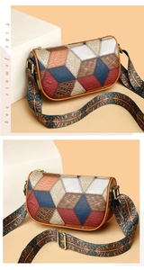 Close-up of 3D geometric patchwork patterns and colorful leather textures on handbag