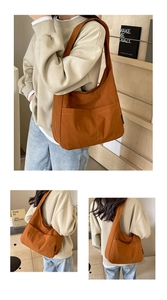 Close-up of caramel waterproof nylon hobo bag featuring large functional outer pockets
