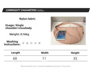 Size chart for pink nylon crescent tote bag showing 60x11x35cm dimensions and weight