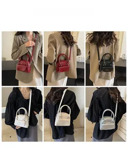 Showcasing four colors of mini wedding handbags with top handles and shoulder straps