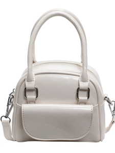 Elegant cream white top-handle bridal handbag with round silhouette and front flap pocket