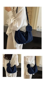 Detail view of deep blue denim crossbody bag featuring a practical round coin purse attachment