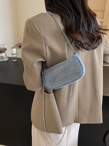 Light blue denim shoulder bag with silver rhinestones and chain strap for women
