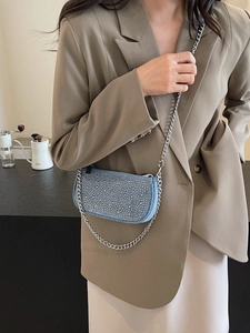 Chic light blue denim crossbody bag with rhinestones and silver chain strap for women