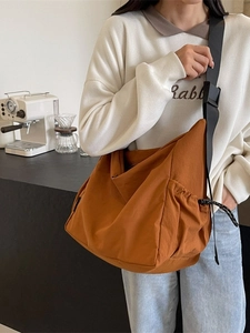 Large Japanese style canvas crossbody bag in burnt orange with wide adjustable strap