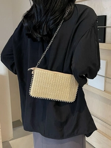 Straw woven crossbody bag for women with silver metal beads and chain strap for summer
