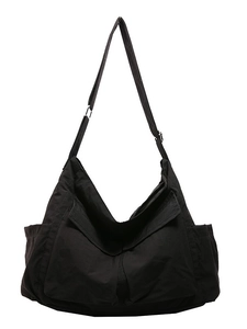 Black high-capacity utility crossbody bag with adjustable strap and multiple cargo pockets