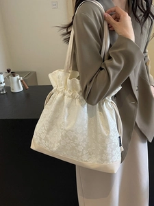 Chic cream white drawstring tote bag with floral jacquard pattern for women fashion