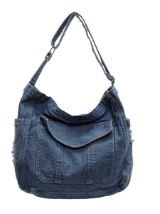 Fashionable large capacity denim hobo tote bag in washed blue with frayed edges and strap