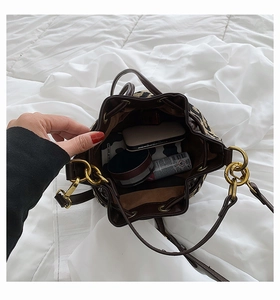 Detail view of animal print bucket bag interior showing spacious storage for essentials