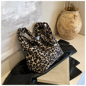 Leopard print canvas tote bag detail with premium material texture and large capacity