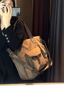 Waterproof nylon tote bag with metal chain detail and adjustable strap for women