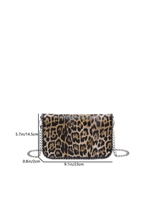 Leopard print crossbody bag with silver chain strap and metal studs on the bottom