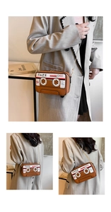 Detail of vintage cassette shape crossbody bag with brown PU leather and gold chain