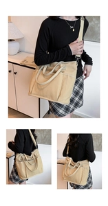 Detail of khaki canvas tote bag showing outer pockets and adjustable shoulder strap