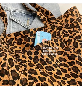 Detail shot of the front pocket on the leopard print tote bag for easy storage