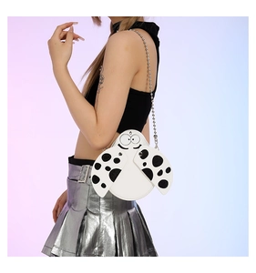 Detailed view of the cute ladybug crossbody bag with black dots and metallic chain