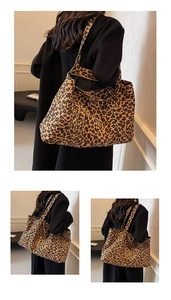 Detailed view of the leopard print tote bag fabric and wide shoulder strap texture