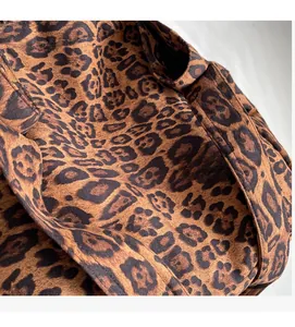 Close-up of soft leopard print fabric texture on a large capacity stylish tote bag