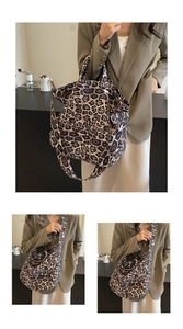 Detailed close-up of a large leopard print tote bag with durable canvas fabric and wide straps