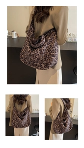 Close-up of leopard print canvas tote bag showing large capacity and soft texture