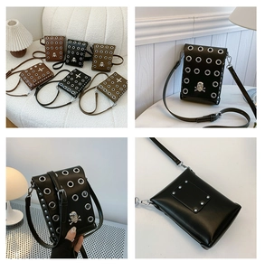 Detail showing back pocket and metal eyelets on a punk style crossbody phone bag
