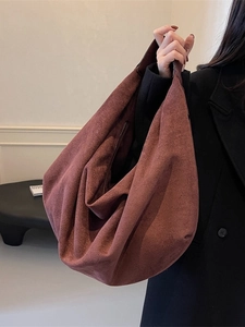 Large terracotta hobo bag in soft matte suede finish for professional autumn style