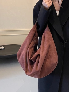Large red-brown suede hobo shoulder bag with a minimalist half-moon silhouette