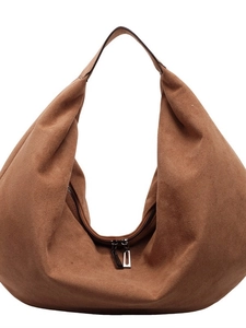 Brown suede hobo shoulder bag with large capacity and double zipper detail on white background