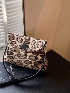 Chic leopard print crossbody bag for women with black leather strap and metal clasp