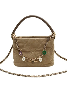 Elegant brown quilted crossbody bag with star embroidery and colorful enamel charms