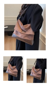 Detail of caramel suede tote bag featuring contrast stitching and adjustable shoulder strap