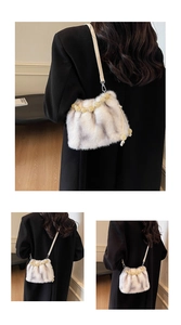 Faux fur bucket bag with gradient grey plush finish and elegant beaded handle detail
