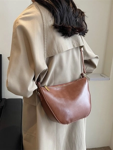 Classic brown crescent shoulder bag for women with gold zipper in high-quality finish