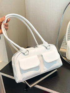 Vintage white faux leather shoulder bag with double front pockets and twin handles